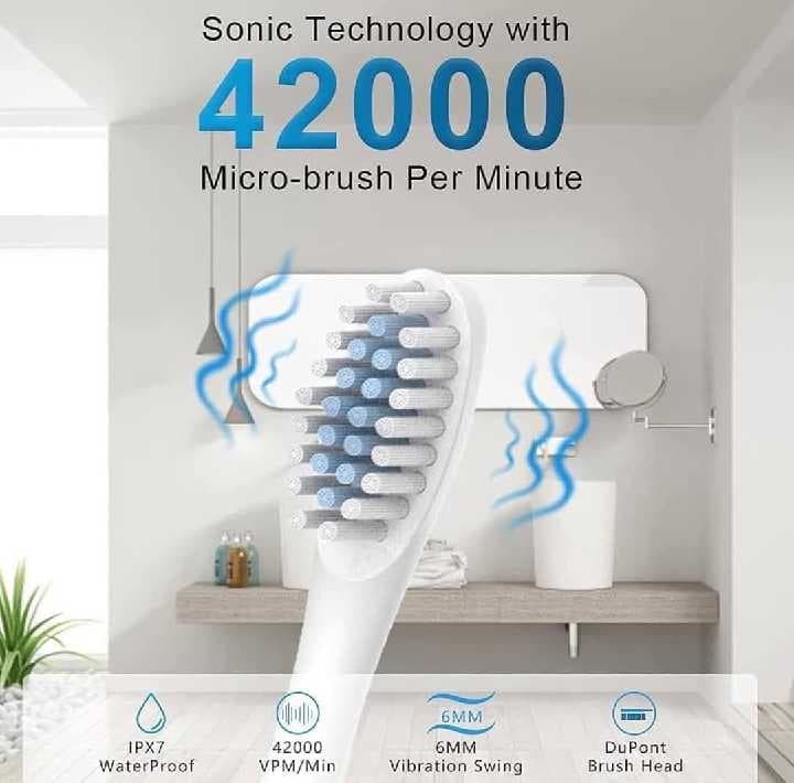 cepillo electrico dental con cabezales de repuesto 2