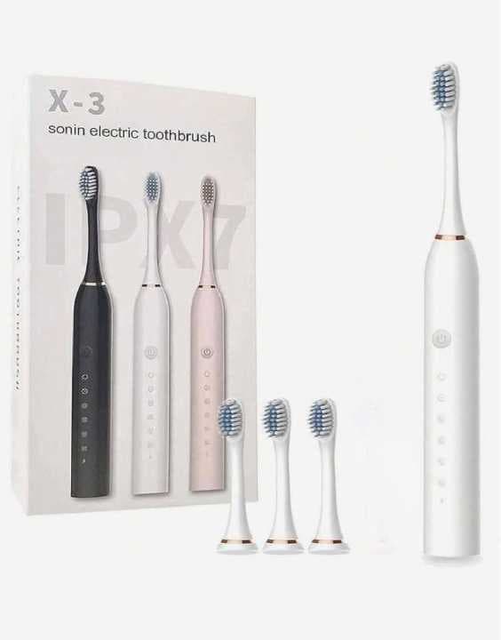 cepillo electrico dental con cabezales de repuesto
